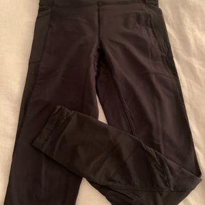Lululemon leggings. Vintage. Full length with design on pockets and lower legs